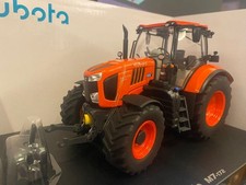 Trattore Kubota M7-172 scala