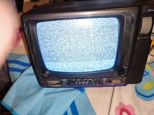 Televisor portatil blanco - , y