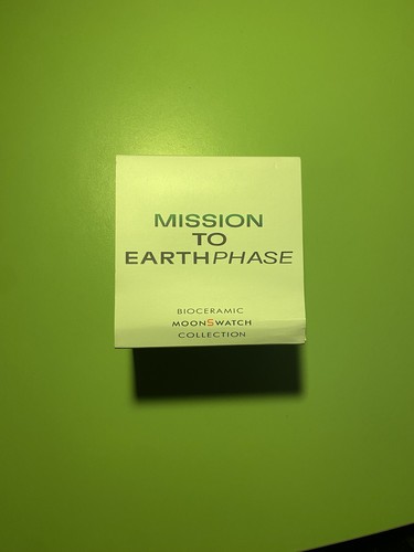 Swatch omega earthphase - x,