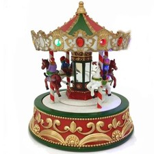 Giostrina di natale giostra con cavalli per bambini luce suoni e movimento H21