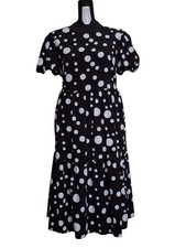 Vestito svasato a pois grandi color bianco con maniche corte a palloncino