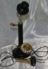 Antico telefono nero decorativo a candela con rotella ottone metallo a ruota