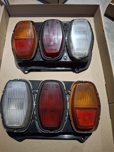 Fiat 128 coppia fanali - di,