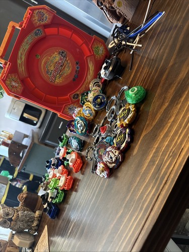 Lotto ricambi beyblade takara - ricambi,