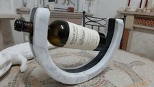 Curved bottle holder - , in