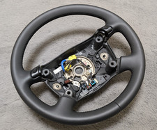 NEW LEATHER STEERING WHEEL