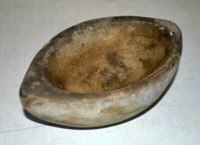 Antico vecchio mortaio macina