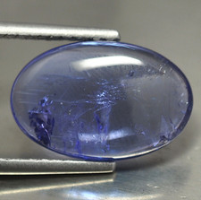 GRANDE TANZANITE NATURALE CT. 9,70 FORMA OVALE CABOCHON IN BLISTER
