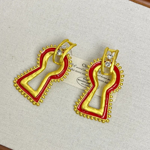 Orecchini schiaparelli con - orecchini,