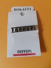 Spilla in metallo FERRARI -