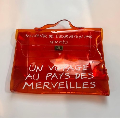 Borsa vinile arancione - in,