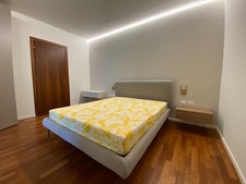 letto matrimoniale schienale imbottito modello Benny con materasso 