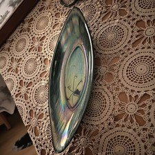 Consolle ovale blu iridescente