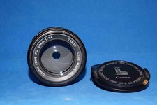 Canon FD 50 mm f 1.4,  tappi