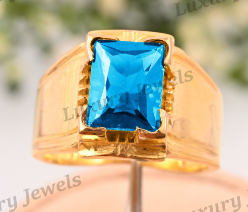 Anello uomo topazio blu
