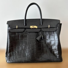 Borsa a mano in pelle goffrata