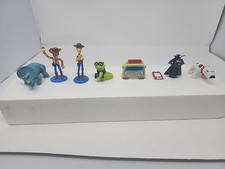 8 Toy Story Figurines Y9