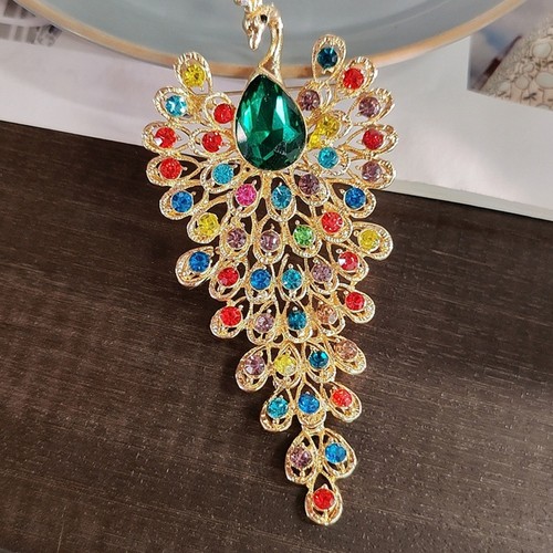 Spilla pavone elegante