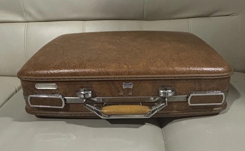 American tourister brown vinyl - american,