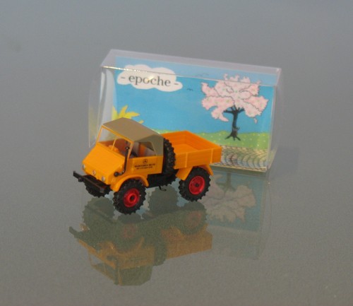 Unimog 411 arancione - █►,