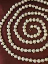 Collana LUNGA di Perle Acqua Dolce montatura Arg Sterling dorato. 