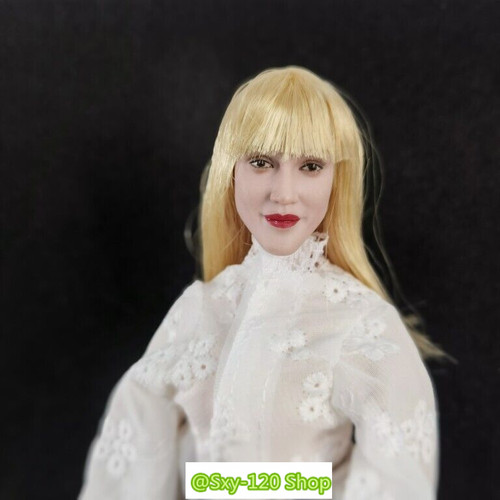 Scultura testa capelli rossi