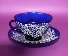 Tazza e piattino in vetro di