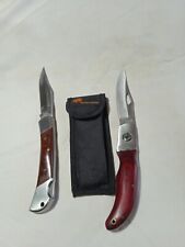 COLTELLI SPORTIVI. CACCIA PESCA. ANNI 80. UNO CON CUSTODIA E CON MANICI IN LEGNO