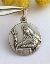 MEDAGLIETTA RAFFIGURANTE "