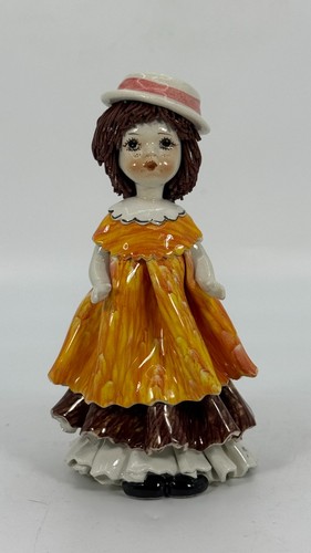 Statuina bambola ceramica