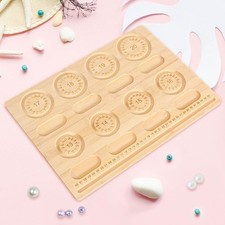 Tavole di perline per la