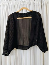 Tiana B. Spalline nere all'uncinetto taglia L