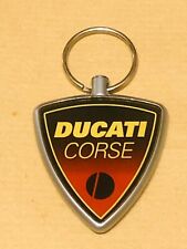 MOTO RICAMBI ACCESSORI PORTACHIAVI DUCATI CORSE TUMI RACE SCUDETTO DOPPIA FACCIA