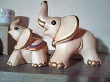 thun coppia di elefanti con cuore dorato 