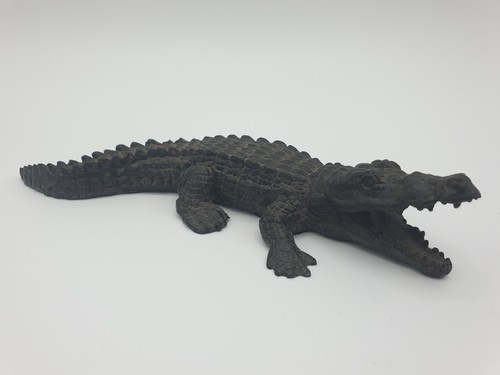 Coccodrillo nero bronzo - in,