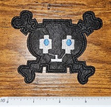Cube Cartoon Skull & Cross