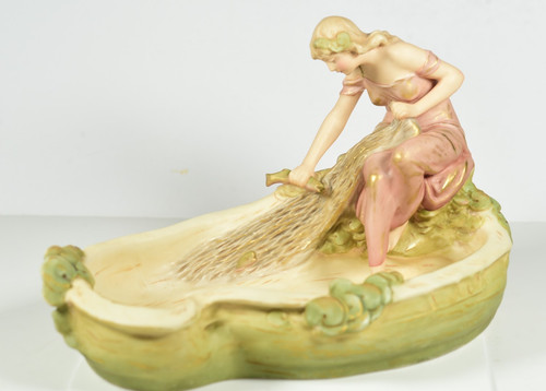 Antico centrotavola statuina
