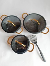 Set padelle antiaderente a due manici in pietra lavica e con coperchio più spato