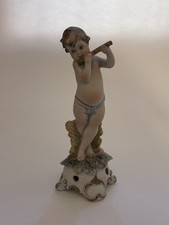 Statuina Capodimonte – putto con flauto in porcellana biscuit