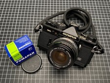 Olympus OM-2N + Zuiko 28mm