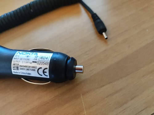 Adattatore carica batteria per