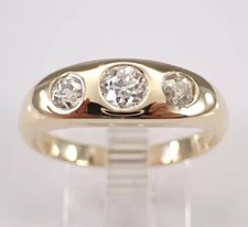 Anello 3 pietre taglio tondo