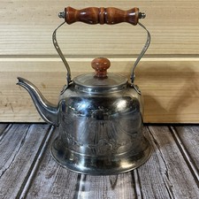 Antica teiera bollitore in