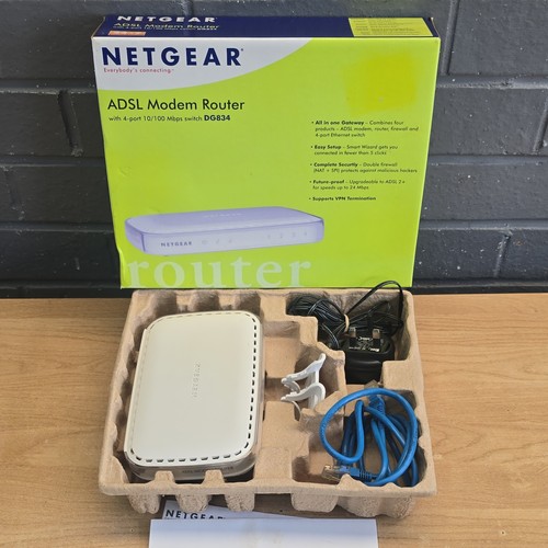 Netgear dg834 modem router - netgear,