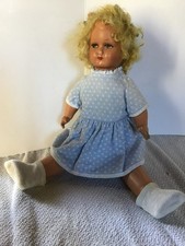 Bambola in cartapesta e compo