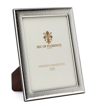 Cornice in argento massiccio