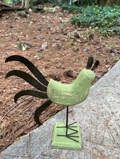 Statuina uccellino verde in