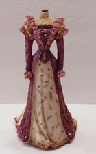 Statuina a forma di abito