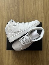 Jordan 1 Mid Triple bianco