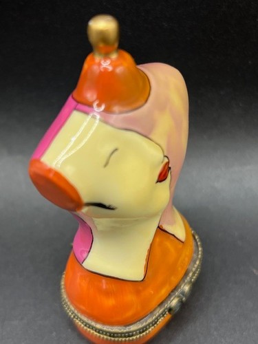 Manichino viso rosa arancione